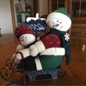 Plush Snowmen Sledding